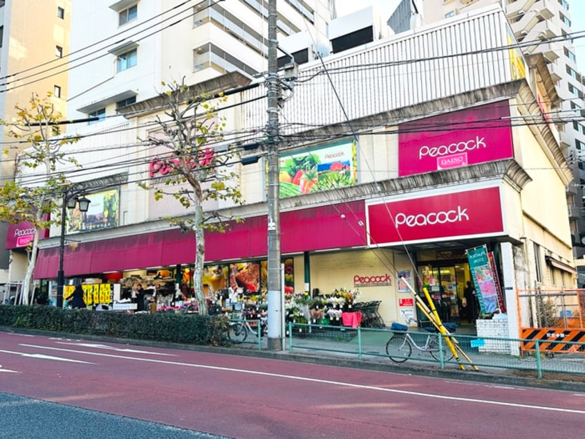 ピーコック魚籃坂店(スーパー)まで180m Ｆ－ＦＬＡＴ