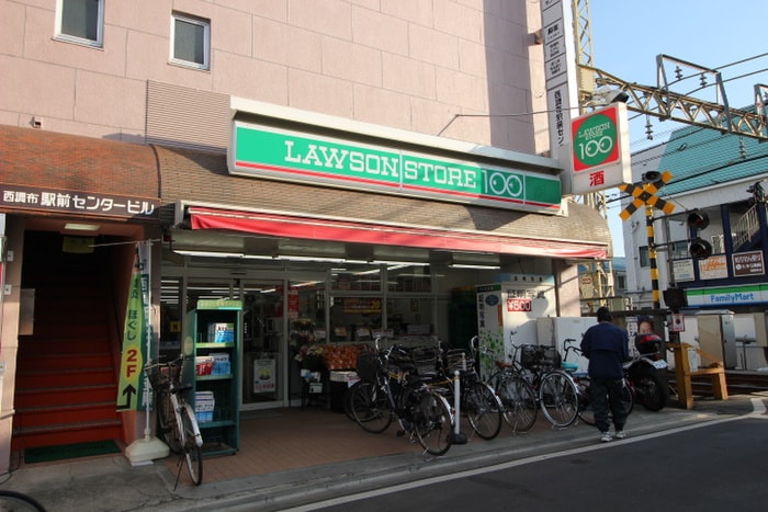 ローソンストア100西調布(コンビニ)まで350m フロ―ラル調布