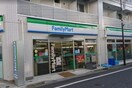 ファミリーマート　丸萬千川駅前店(コンビニ)まで394m カルージュ要町