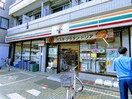 セブン-イレブン 国立中店(コンビニ)まで450m フラワーヴィレッジィ