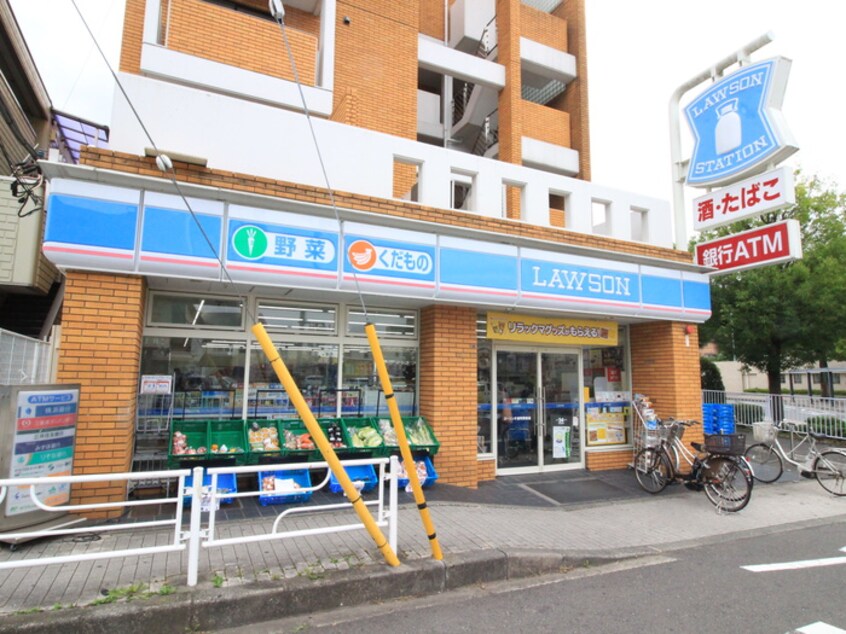 ローソン片倉町駅前店(コンビニ)まで69m ドエル飯田