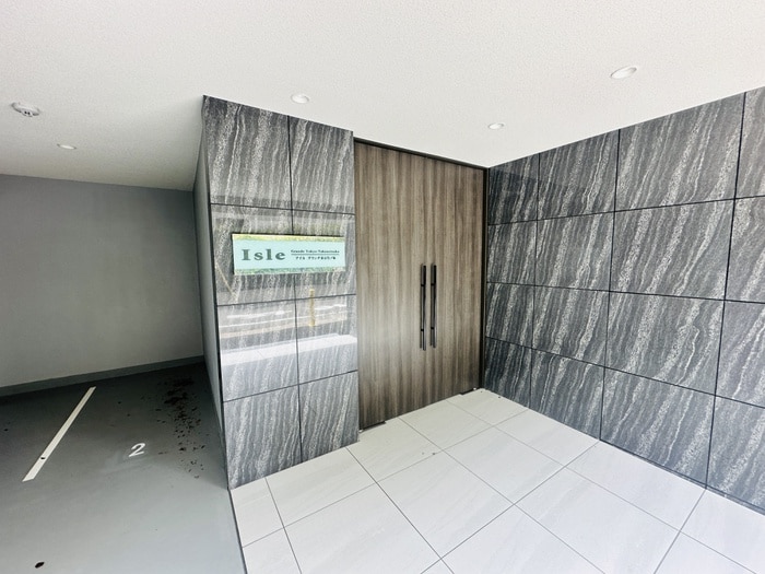 エントランス部分 アイル グランデ東京竹ノ塚
