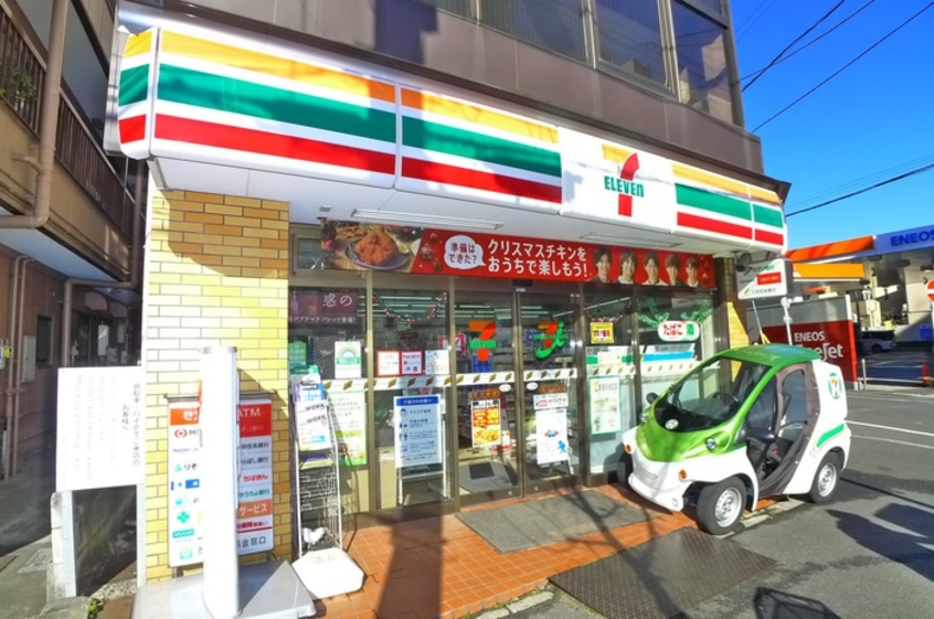 セブンイレブン(コンビニ)まで124m ハーモニーテラス北小岩XⅡ