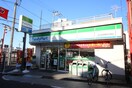 ファミリーマート　田口屋西新井大師店(コンビニ)まで267m エスパシオＥ
