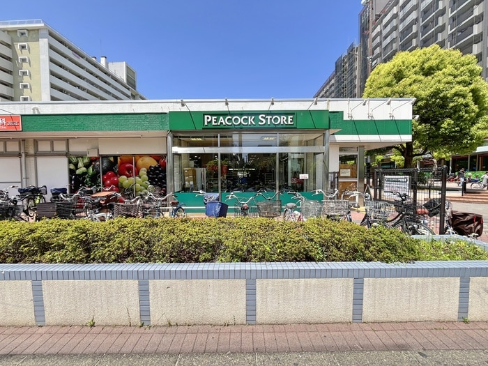 ピーコック(スーパー)まで120m グランカーサ大島