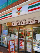 セブンイレブン調布南駅前店(コンビニ)まで672m 鈴江テラスハウス