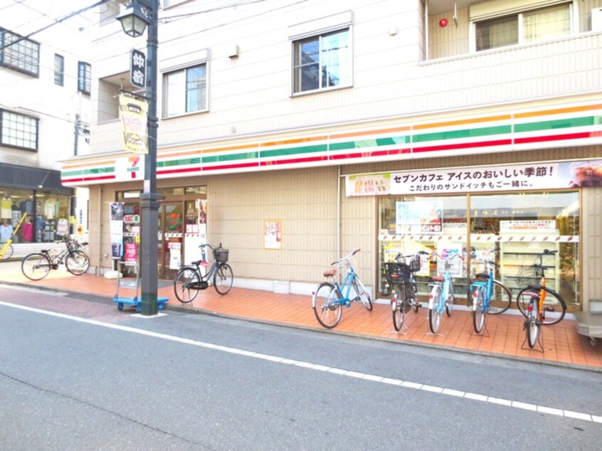 セブンイレブン仲宿商店街店(コンビニ)まで150m ハーモニーテラス仲宿