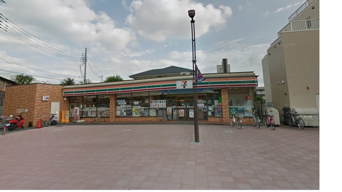 セブンイレブン 調布飛田給駅北口店(コンビニ)まで396m サンライズコートⅠ