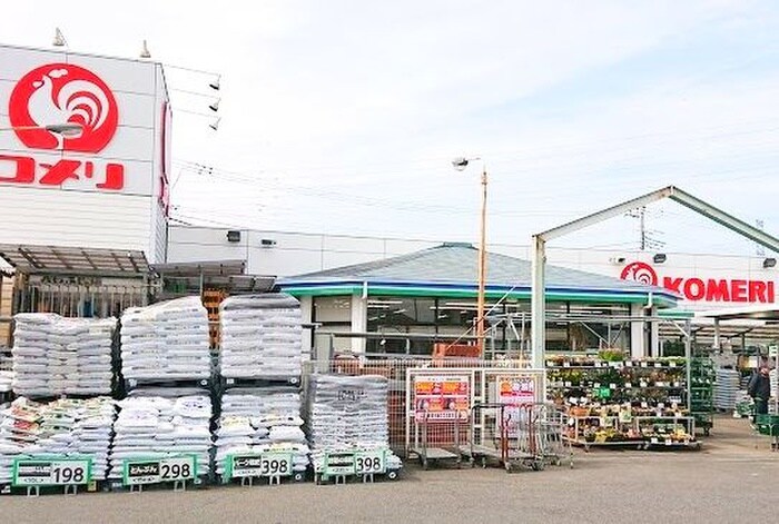 コメリ(電気量販店/ホームセンター)まで850m ウッディハウスⅡ