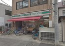 ローソンストア100立川羽衣町店(コンビニ)まで350m プラリネットハイツ