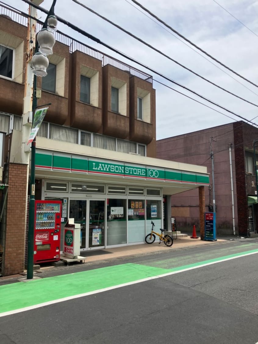 ローソンストア100草加住吉店(コンビニ)まで260m リブリ・丸屋
