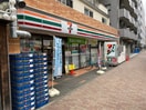 セブンイレブン新丸子店(コンビニ)まで299m フラット９１