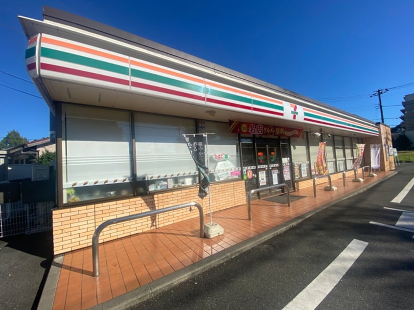 セブンイレブン(コンビニ)まで151m アルカス聖蹟Ⅱ