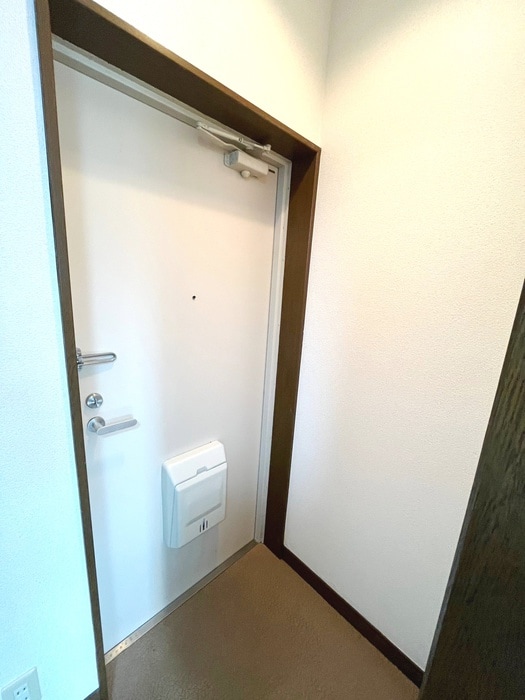 玄関 丸惣ビル