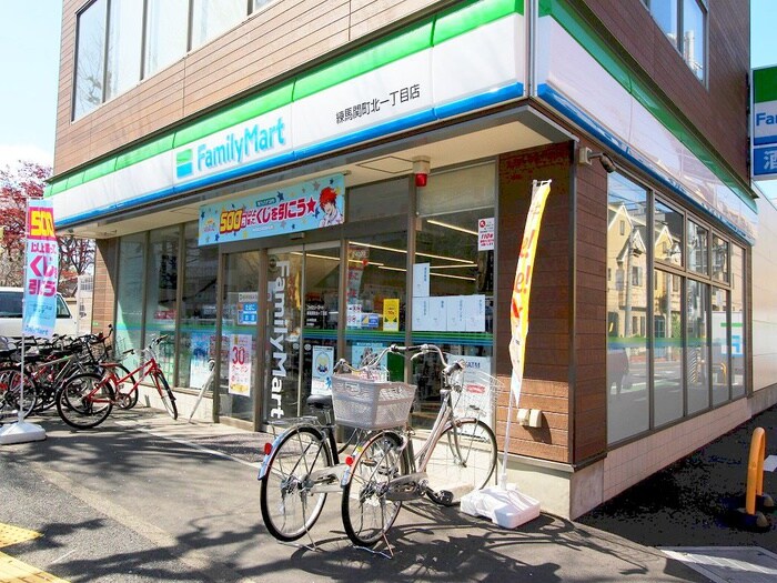 ファミリーマート 練馬関町北一丁目店(コンビニ)まで450m タキハイツ