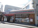 セブンイレブン古市場店(コンビニ)まで210m 村石ビル