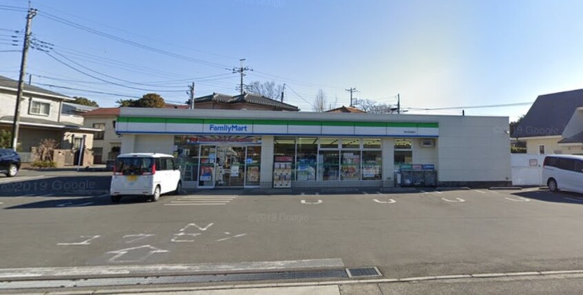 ファミリーマート 羽村羽加美店(コンビニ)まで70m エムハイツ