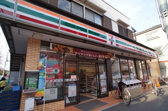 セブン-イレブン 小平一橋学園駅前店(コンビニ)まで450m リブリ・Ｔメゾン