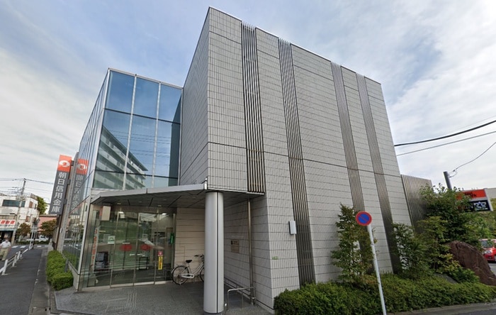 朝日信用金庫　西新井支店(銀行)まで221m 眞和マンション