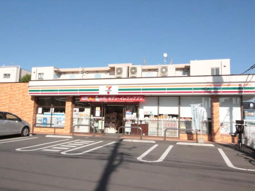 セブンイレブン(コンビニ)まで450m コスモスビレッヂ