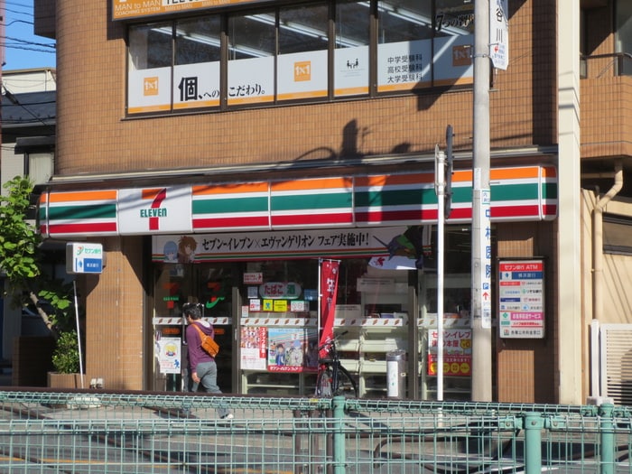 セブンイレブン(コンビニ)まで60m エスティメゾン登戸