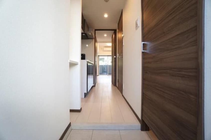 玄関 ｼﾞｪﾉｳﾞｨｱ京成立石Ⅳｽｶｲｶﾞｰﾃﾞﾝ