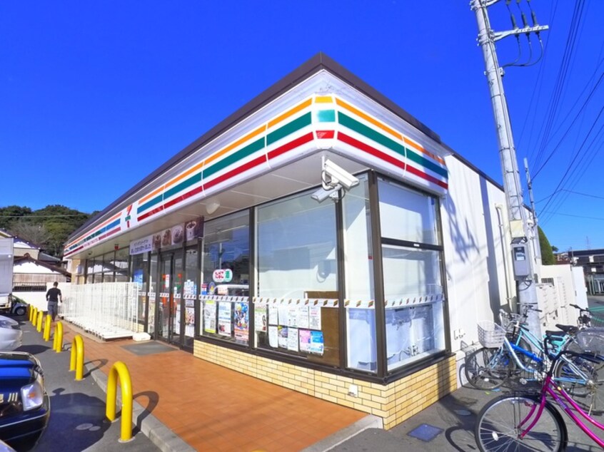 セブンイレブン(コンビニ)まで400m ハーモニック　プレイス