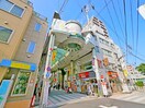 ハッピーロード商店街(ショッピングセンター/アウトレットモール)まで1074m メゾンＲＩＫＩ