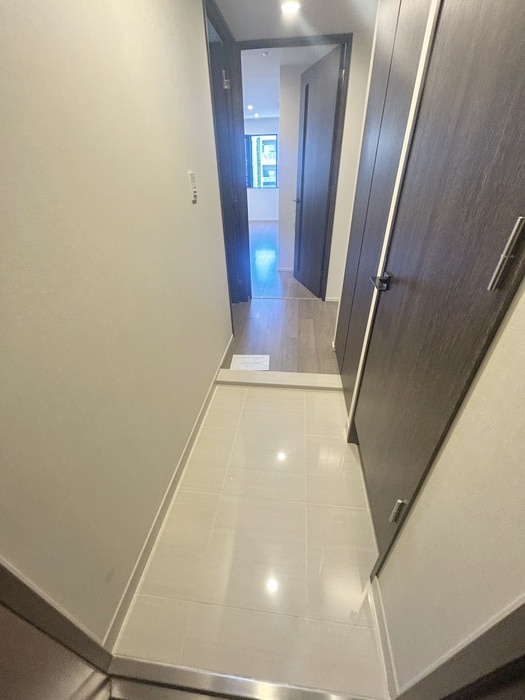 玄関 ﾘﾋﾞｵﾚｿﾞﾝ月島ｽﾃｰｼｮﾝﾌﾟﾚﾐｱ