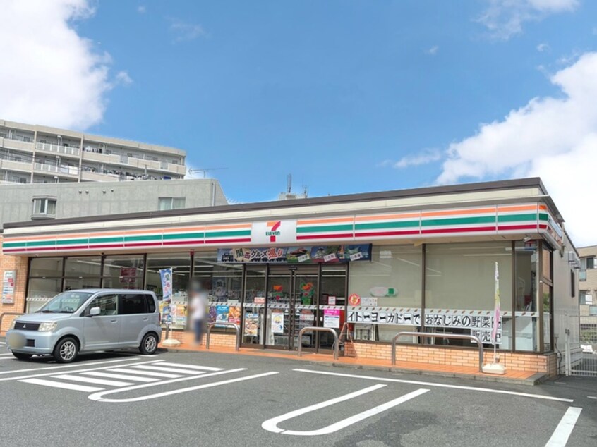 セブンイレブン多摩鶴牧2丁目店(コンビニ)まで76m ミネックス