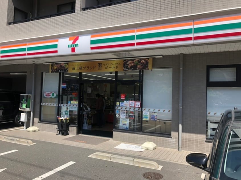 セブンイレブン(コンビニ)まで412m ドミ―ル富岡