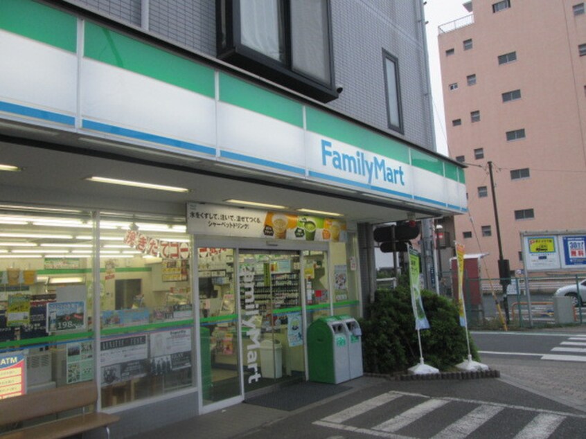 ファミリーマート小金井桜町店(コンビニ)まで336m 小金井本町宅