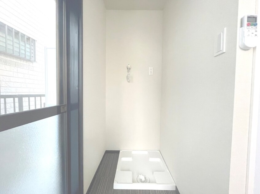 洗濯機置場 ウッディコーポ東六月町