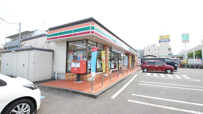 セブン-イレブン 八王子松木店(コンビニ)まで180m リバーサイドジュネス