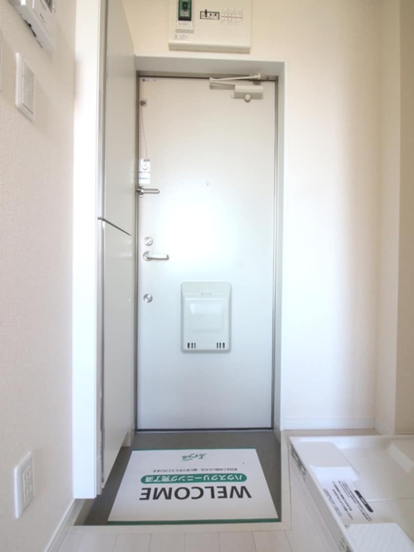 玄関 ラ・スペランツァ高田