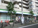ファミリーマート 唐木田駅前店(コンビニ)まで664m ロイヤルレジデンス