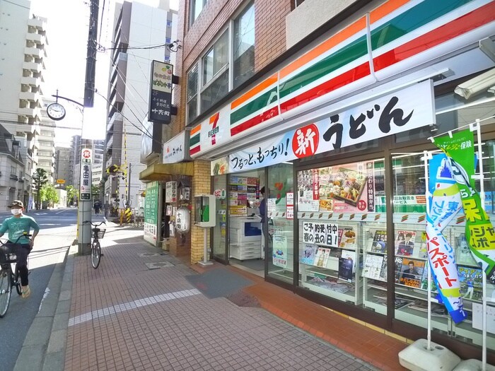 セブンイレブン市川真間店(コンビニ)まで450m プロフィーⅡ