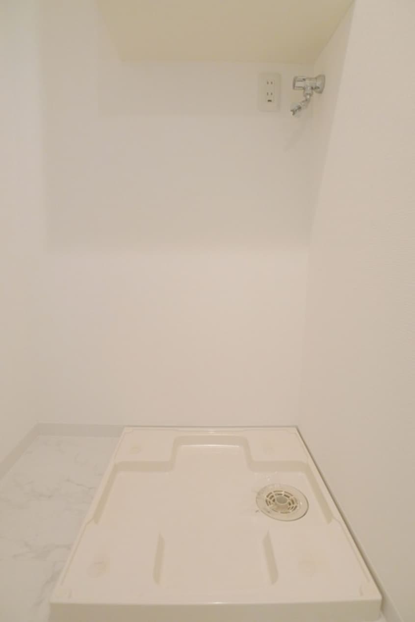 洗濯機置場 ﾆｭ-ｼﾃｨｱﾊﾟ-ﾄﾒﾝﾂ南千住