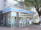 ローソン多摩乞田店(コンビニ)まで438m ドルチェ多摩