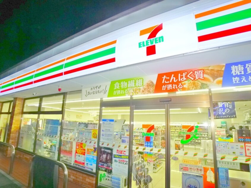 セブンイレブン(コンビニ)まで355m むさし荘