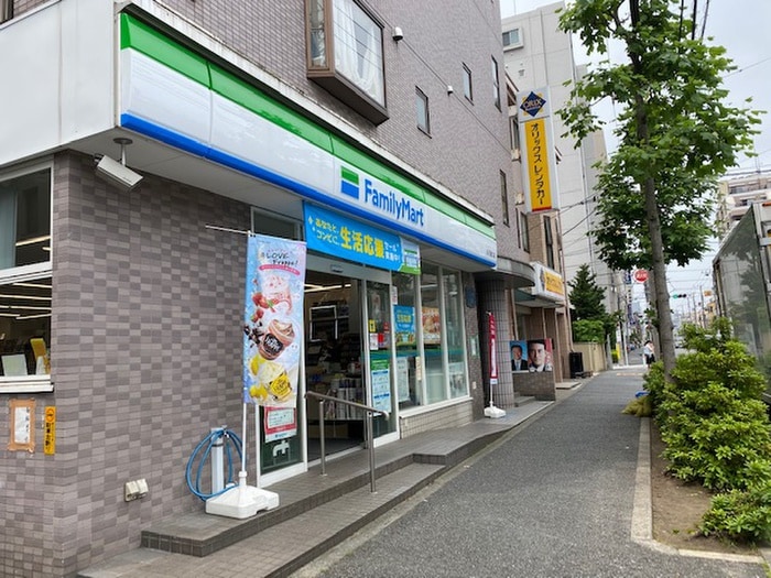 ファミリーマート丸子通り店(コンビニ)まで100m 新丸子グランコートＡｖｅ．