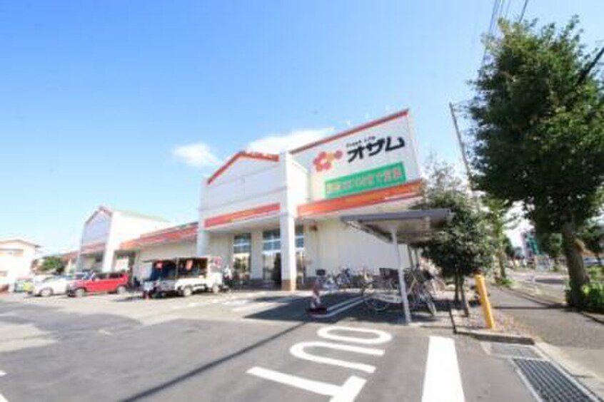 スーパーオザム栄町店(スーパー)まで101m Garage　euphoria