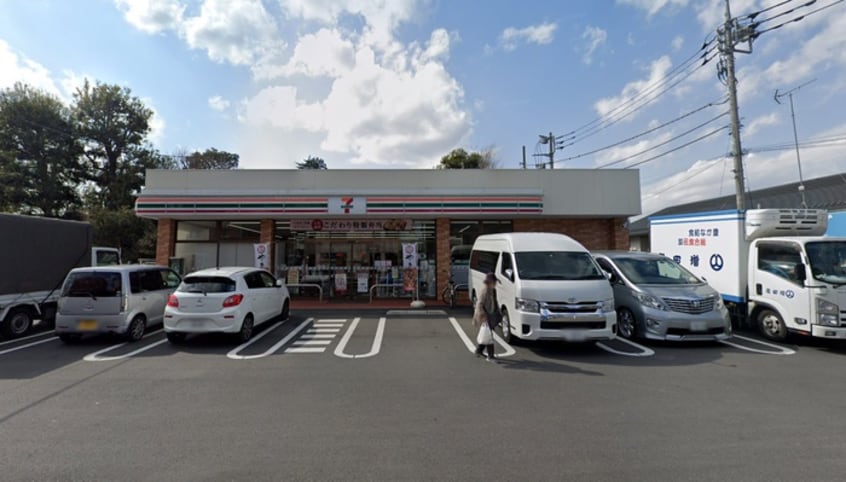 セブンイレブン国立谷保南店(コンビニ)まで297m 宝林ハイツ