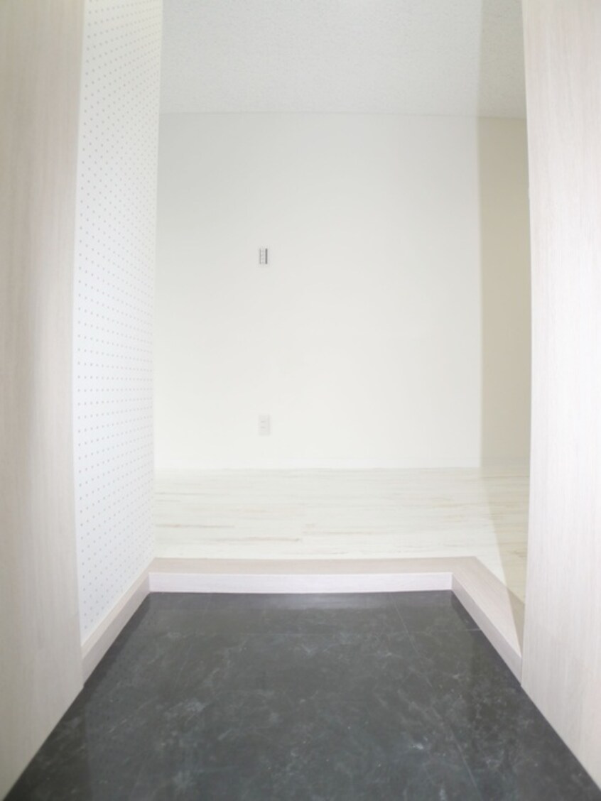 玄関 カーサムジカ北千住