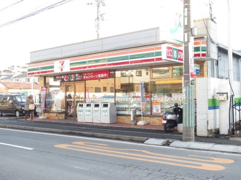 セブンイレブン(コンビニ)まで490m プレジールⅡ