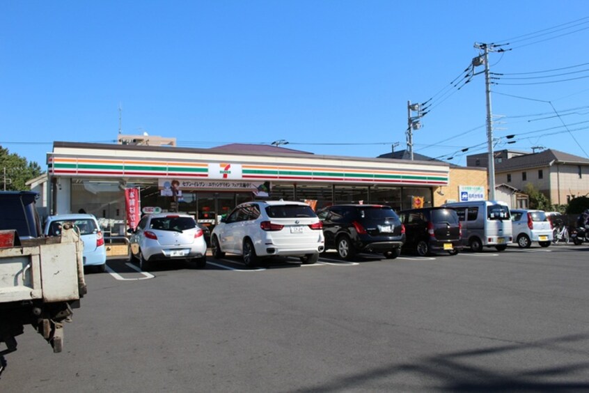 セブンイレブン(コンビニ)まで353m 雅マンション竜城ｹ丘