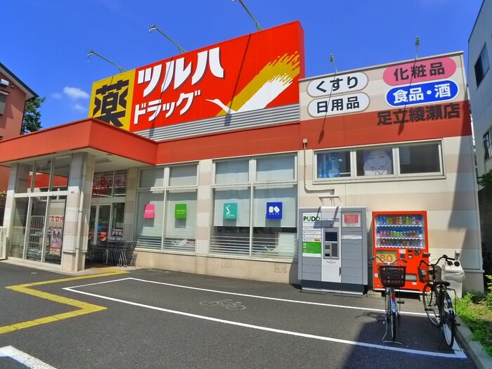 ツルハドラッグ 亀有店(ドラッグストア)まで187m サンコ－ポファミリア