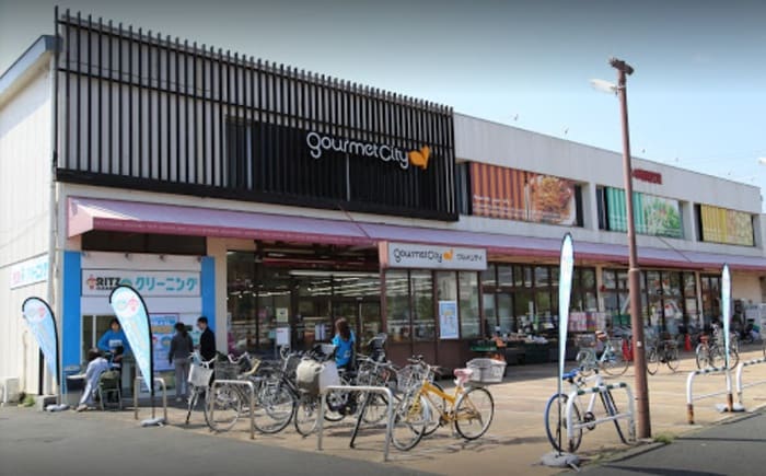 グルメシティ神代店(スーパー)まで699m ブルーフォリスト　２