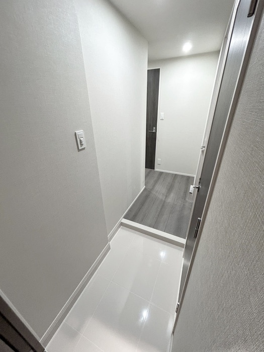 玄関 LIME RESIDENCE KAWAGUCHI EAST