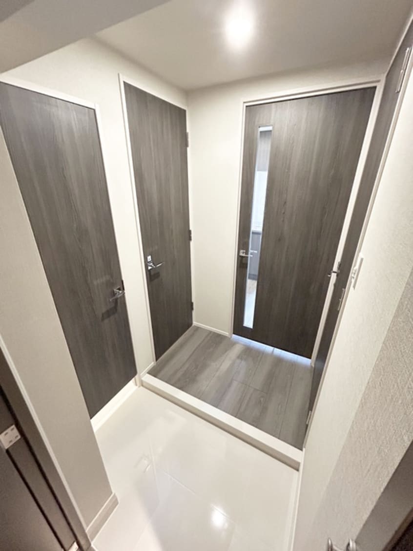 玄関 LIME RESIDENCE KAWAGUCHI EAST